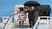 First lady Michelle Obama, President Barack Obama, Malia Obama and Sasha Obama arrive at Jose Marti International Airport for a 48-hour visit on Airforce One March 20, 2016 in Havana, Cuba. (Photo by Joe Raedle/Getty Images)